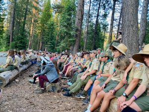 Troops gathering for announcements at camp.